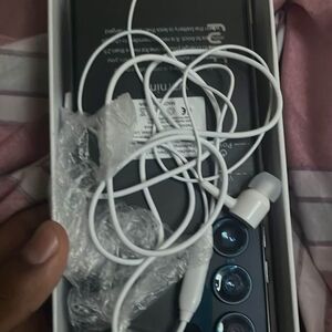 Samsung Smartphone with Black and White Accessories